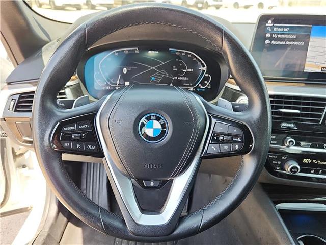 used 2023 BMW 530e car, priced at $35,429