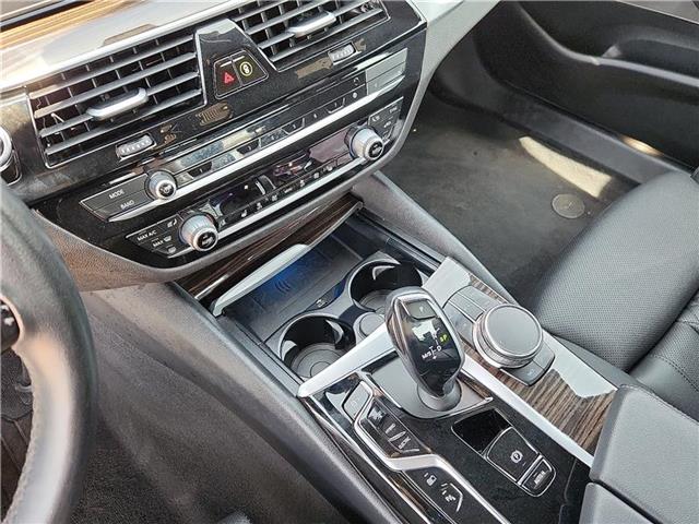 used 2023 BMW 530e car, priced at $35,429
