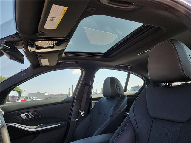 used 2024 BMW 330e car, priced at $38,987