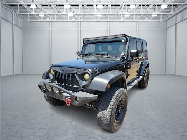 used 2012 Jeep Wrangler Unlimited car, priced at $14,975